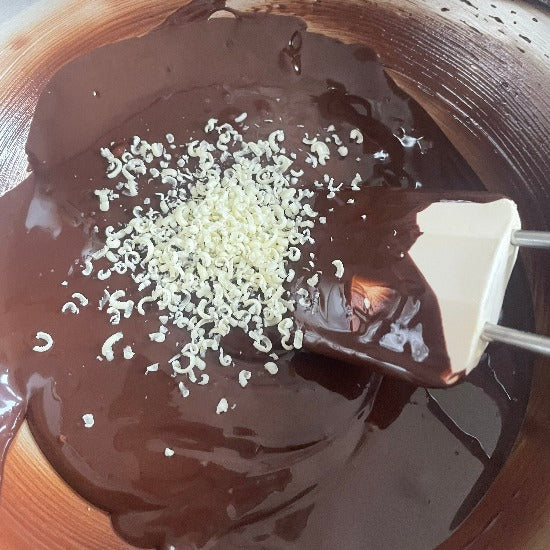 add 1 % to cocoa butter silk to chocolate