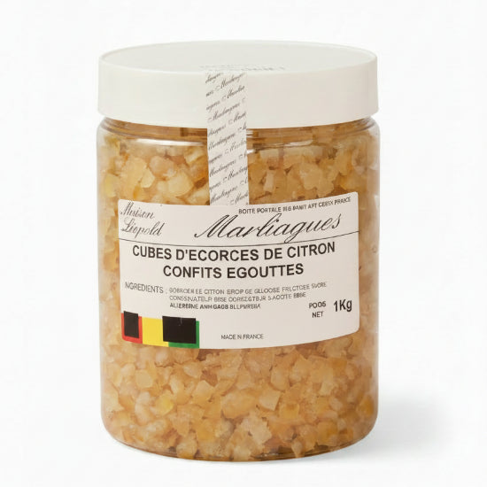 A 1kg  jar of Maison Lepoll Marliagues citron confits egouttes (citron peel cubes) with a white lid,