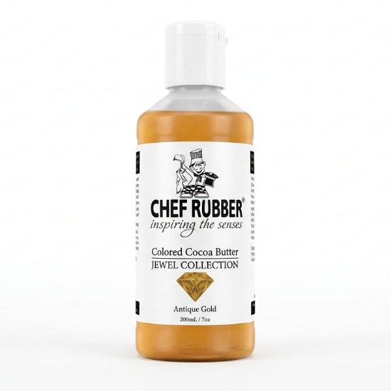 A bottle of Chef Rubber Antique Gold Colored Cocoa Butter in the Jewel Collection, 300ml, shown against a solid black background with a reflection below.