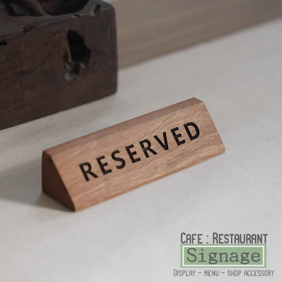 Reserved wooden sigh