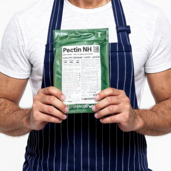 Man holding a package labeled 'Pectin NH' wearing a blue apron on a white background